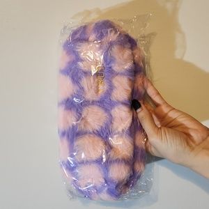 Cute purple bag , with pink hearts,(never opened,has the word "truly" on it)
